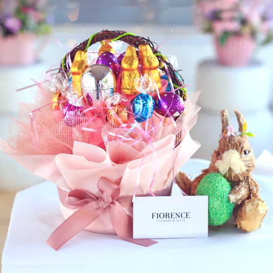 Handmade Easter basket with chocolates and Coco our straw bunny